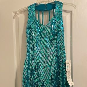 Teal mini sequin dress. New with tags. Labeled as petite but fits Juniors sz 4-6